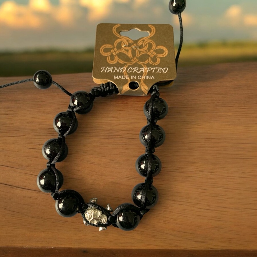 Unisex Black Beaded Bracelet with Silver Skull and Cross Bones Accent